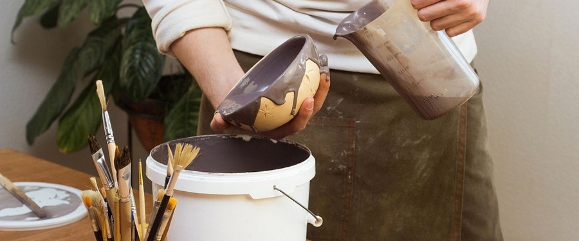 Ceramic Artist Man glazing on master class